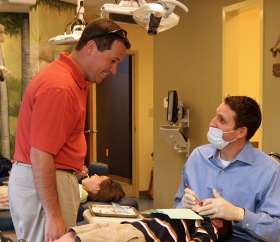Canton Georgia board-certified pediatric dentist talking to parent