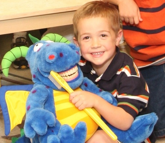 Young patient smiling during visit to Canton Georgia children's dentist