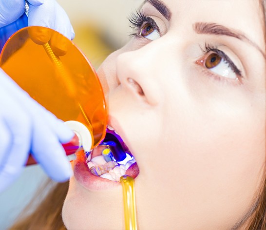 Child receiving dental bonding