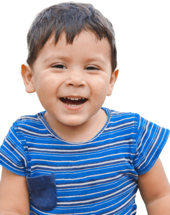 Toddler with healthy smile after dentistry for toddlers