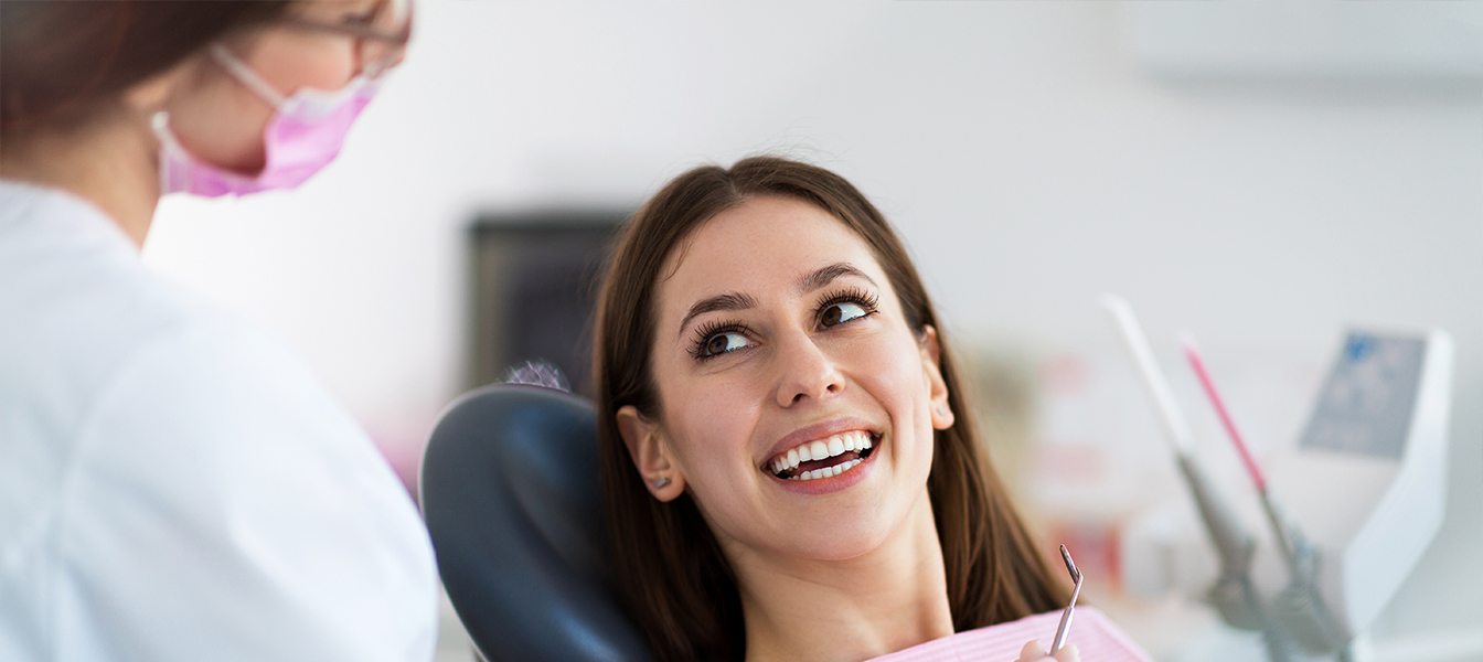 Patient smiling at pediatric dentist