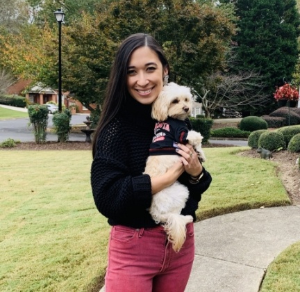 Doctor Piche holding her dog